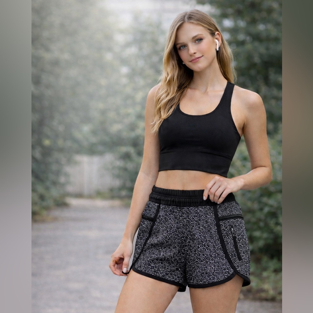 Lululemon Tracker Short IV in the Floral Freckle Flower Black White pattern